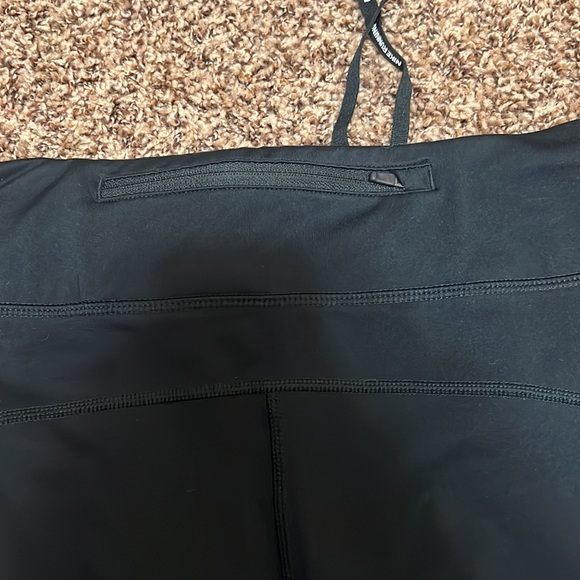 Nike Dri Fit size small black leggings. EUC. zip back pocket, mesh calf detail. - Picture 10 of 11